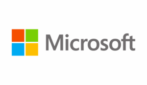 Microsoft-logotyp med fyra färgade rutor (röd, grön, blå, gul) bredvid det grå ordet "Microsoft" och en STV-inspirerad touch på en grå bakgrund.